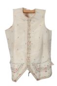 An 18th century, George III gentleman’s, ribbed cream silk waistcoat, embroidered with fine