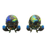 A pair of Chinese cloisonné enamel frog-form egg trinket vessels, each with polychrome floral and