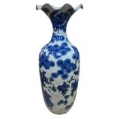A large Japanese blue and white vase, decorated with a landscape, flowers and cranes, 76cm high
