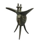 A Chinese bronze ceremonial jue vessel, 16cm high.