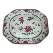 A Chinese export porcelain octagonal meat dish, famille rose decorated with floral sprays to the