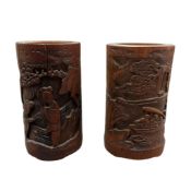 A Chinese bamboo ‘Red Cliff’ brush pot and another, 12cm high, (2)
