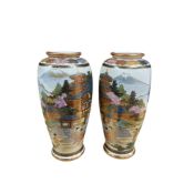 A pair of late Satsuma pottery vases, height 18cm.