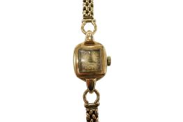 A lady's 1970's 9ct gold Omega manual wind wrist watch, with baton numerals, dial a.f., on a 9ct