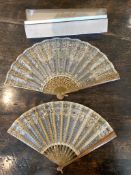 Two 19th century blonde tortoiseshell and sequin fans, one brise cut with ornate classical pillar
