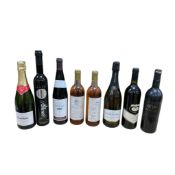 Eight bottles of wines and spirits, including two bottles of La Reine des Soies, Athénée Ouzo, Le XV