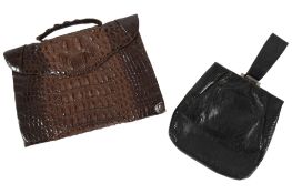 Two 1930’s bags; a black lizard bag, chrome frame and clasp, central handle, suede interior,