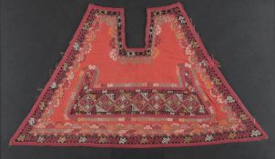 A late 19th century framed, young woman’s Kiymeshek garment, of the Karakalpak people, Uzbekistan,
