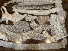 A small collection of 18th and 19th century mixed hand made laces, including two lengths of Mechlin,
