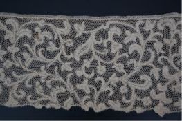 A length of 1740-1760 Italian, Milanese bobbin lace flounce, made from flat braiding or tapes,
