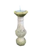 An octagonal reconstituted stone garden sun dial, width 25cm, depth 25cm, height 86cm