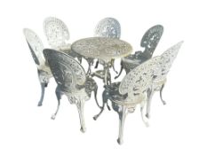 A Victorian style circular aluminium garden table, diameter 68cm, height 69cm together with a set of