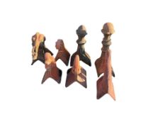 Seven assorted earthenware ridge tiles, largest height 62cm