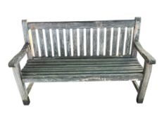 Two weathered teak slatted garden benches, larger width 155cm, height 95cm