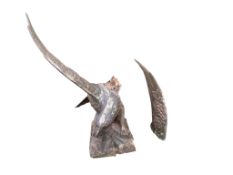 A large cast iron eagle garden ornament, one wing detached, height 112cm