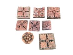 Eight assorted stone garden tiles, largest 25cm square