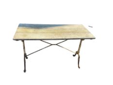 A Victorian painted cast iron garden table with slatted wood top, width 119cm, depth 54cm, height