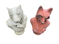 Two stone garden ornaments, modelled as a badger and a fox, largest height 42cm