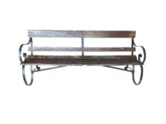 A painted slatted wrought iron garden bench, width 180cm, height 78cm