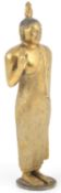 A Sri Lankan gilt metal standing figure of Buddha, possibly Kandyan period, height 19.