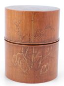 A Japanese gold lacquered cherry wood Natsume (tea caddy), with an inner lid, decorated with bamboo,