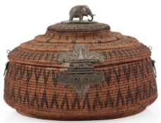 A Sri Lankan silver mounted oval woven cane basket, vel-pettiya, first half 19th century, surmounted