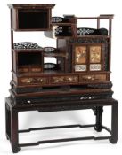 A Japanese Shibayama and ivory decorated hardwood Shodana cabinet, Meiji period, decorated with