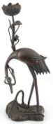 A large Japanese bronze ‘crane’ figural pricket candlestick, 19th century, the crane of grasping a
