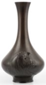 A Japanese ‘minogame’ bronze vase, signed Akichika, Meiji period, cast in relief with a minogame
