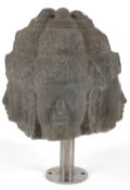 A Southern India grey stone four faced head of Brahma, height 42cm, excluding later metal stand