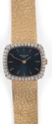 A lady's late 20th century 18ct gold Patek Philippe manual wind dress wrist watch, the blue dial