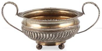 A George III demi- fluted silver two handled sugar bowl, by Thomas Wallis II & Jonathan Hayne,