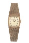 A lady's early 1970's 9ct gold Omega De Ville manual wind wrist watch, with baton numerals, case