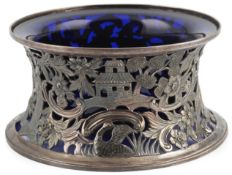 An Edwardian Irish pierced silver dish ring, by West & Son, decorated with figures, bird and
