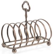 A Victorian silver seven bar toastrack, by Henry Wilkinson & Co, with shaped reeded ring handle,