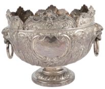 A late Victorian silver two handled Monteith bowl, maker's mark rubbed, the ring handles with lion