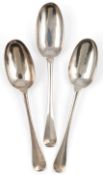 Three early 18th century Britannia standard silver rat-tail tablespoons, one by Henry Greene, London