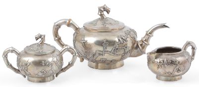 A late 19th/early 20th century Chinese Export white metal three piece tea set by Wahshing of Canton,