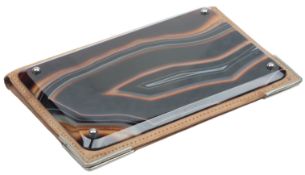 An Art Deco agate wallet, early 20th century, the exterior with rectangular sections of banded