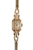 A lady's 18ct gold Breitling manual wind cocktail watch, on an associated 9ct twin strand