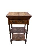 An early 19th century Dutch walnut and marquetry three tier table with hinged twin flap top, width