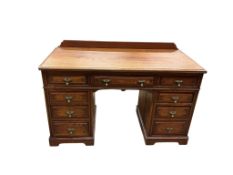 A late Victorian pitch pine kneehole dressing table, width 122cm, depth 54cm, height 71cm