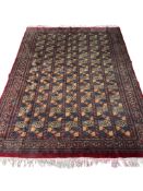 A Bokhara blue ground carpet, 210 x 156cm