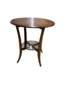 An Ercol 'Golden Dawn' two tier circular table, diameter 60cm, height 63cm