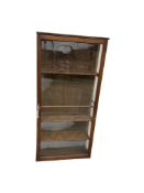 An early 20th century pine and beech shop wall cabinet, width 61cm, depth 20cm, height 129cm