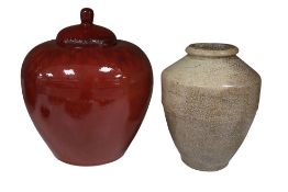 A Chinese sang de boeuf glazed jar and cover, 20th century, together with a crackle glazed vase,
