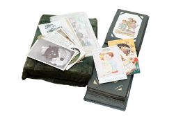 A collection of Great Britain and world stamps arranged in an album including a Penny Black,