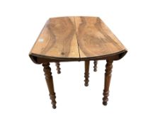An early 20th century French drop flap extending dining table, 197cm extended, depth 116cm, height