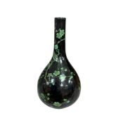 A Chinese painted black and green bottle neck vase, decorated with prunus flowers, 16cm high