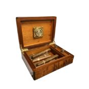 A Dunhill brass mounted thuya humidor, width 25cm with ten Cuban and Jamaican cigars.
